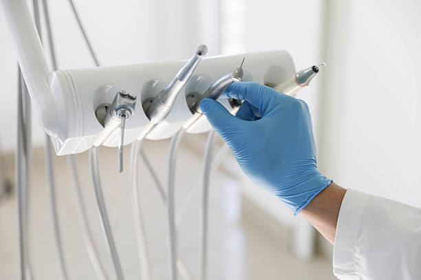 Professional Tooth Extraction technician working in White Hall, AR